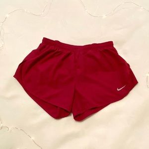 Red Nike dri-fit running shorts